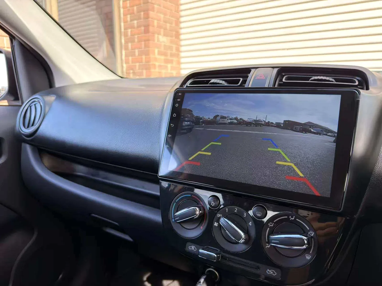 Reverse camera guidelines displayed on an upgraded dashboard screen