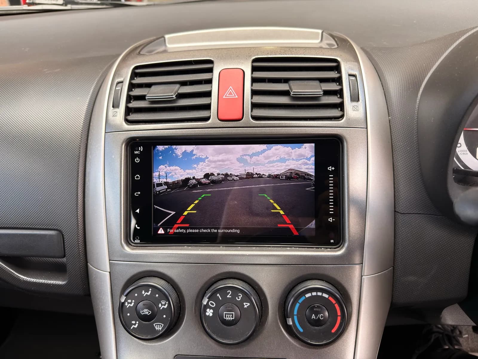 Reverse camera view with coloured parking guidelines on the new head unit in a 2009 Toyota Corolla